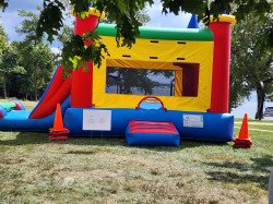 Castle bounce house with dual slide